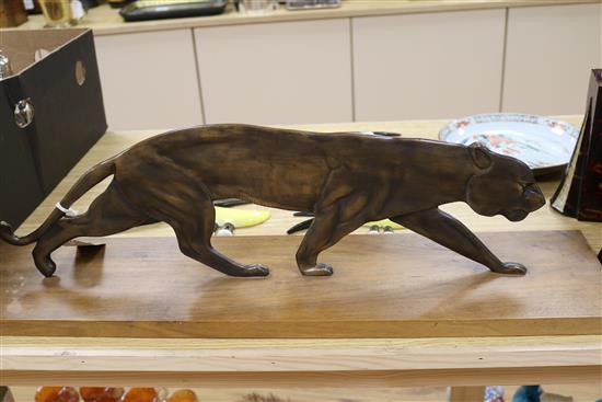 A French Art Deco bronze model of a prowling panther, width 27.5in.